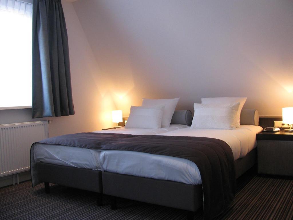 Boutique Hotel De Zwaluw De Koog  Pokoj fotografie